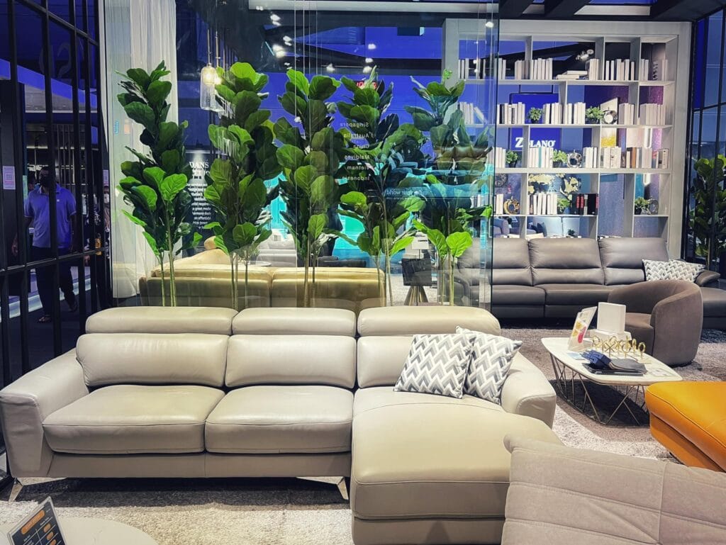 Modern beige leather sofa display at HOMEDec 2022 exhibition.