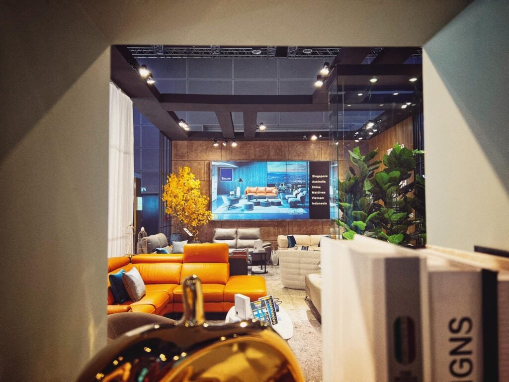 A stylish display of luxury leather sofas at Zolano's HOMEDec 2022 showcase.