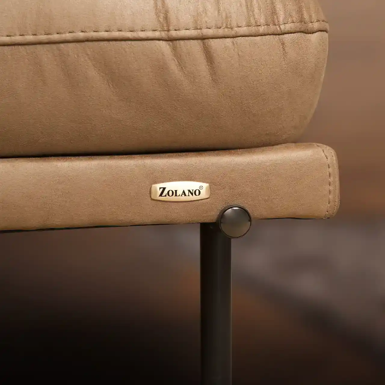 A comfortable beige sofa with Zolano branding, showcasing quality craftsmanship.