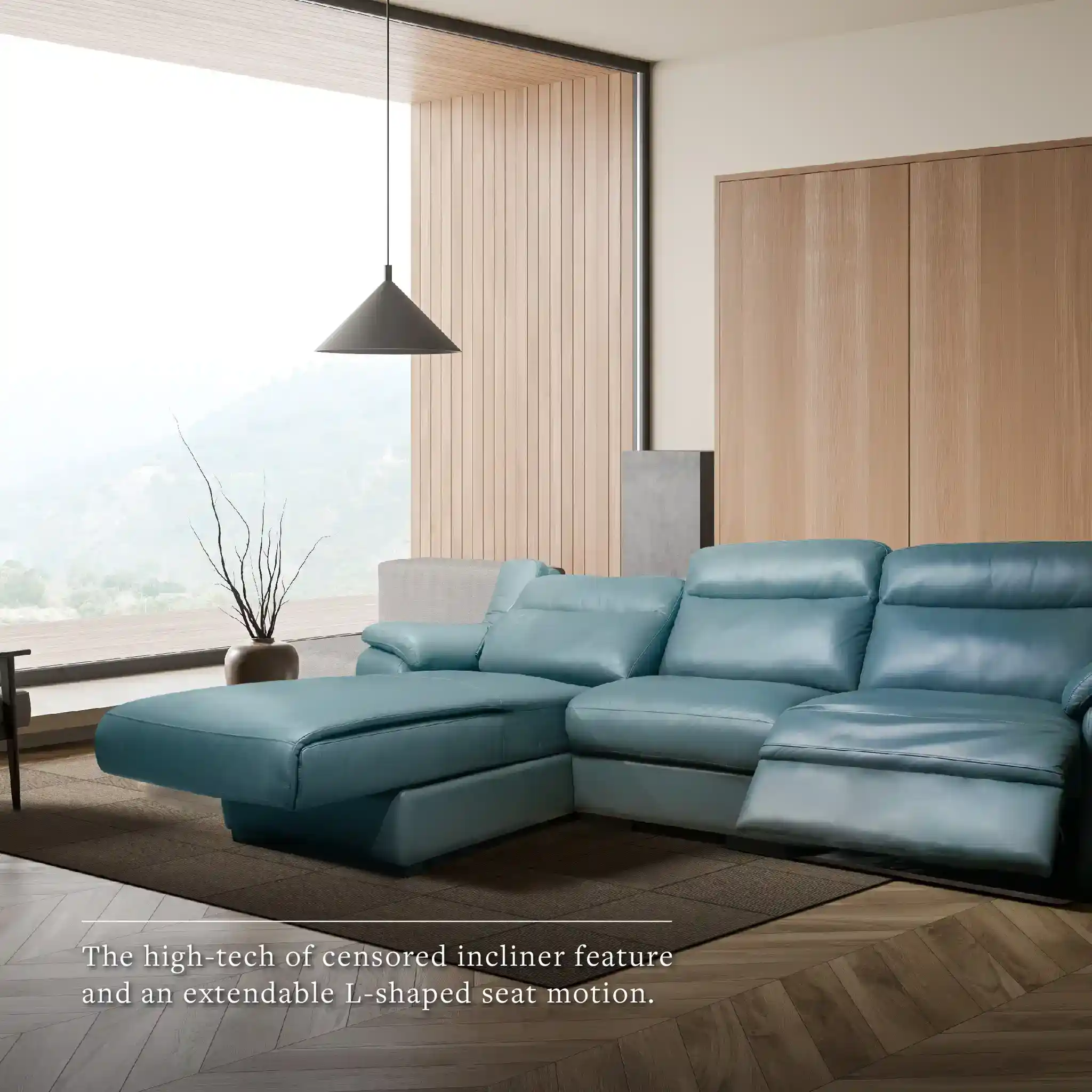 A modern living room with a blue L-shaped sofa, large window, and minimalist decor.