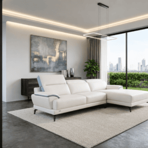 Modern living room with white sofa and city view through large windows.