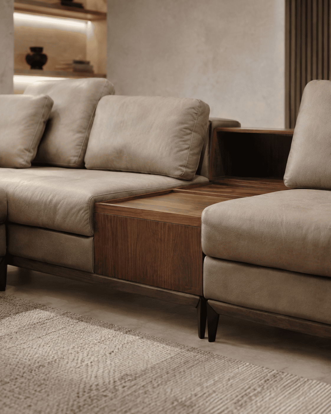 Modern beige sofa with wooden side table in contemporary living room.