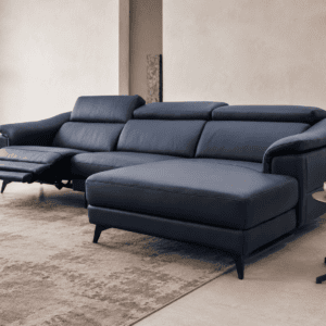 Modern navy blue sectional sofa in a stylish living room setting.