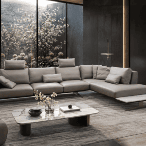 Modern grey sectional sofa in a stylish living room with large window and garden view.