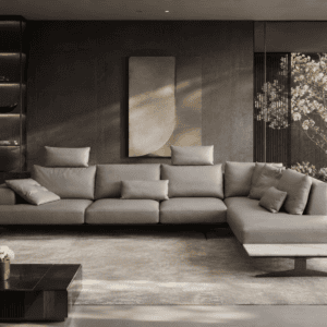 Modern living room with grey sectional sofa and large window with view of trees.