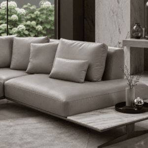 Modern grey sofa with cushions in a stylish living room setting.