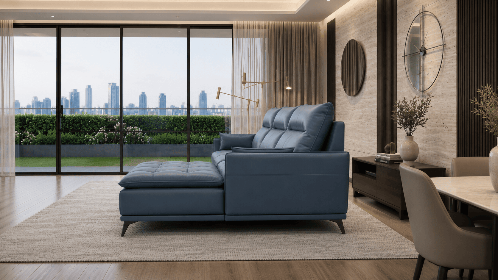 Modern living room with blue sofa, large windows, and city skyline view.