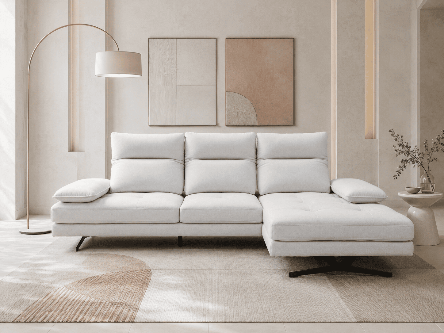 Modern white sofa with cushions in a stylish living room with abstract art.