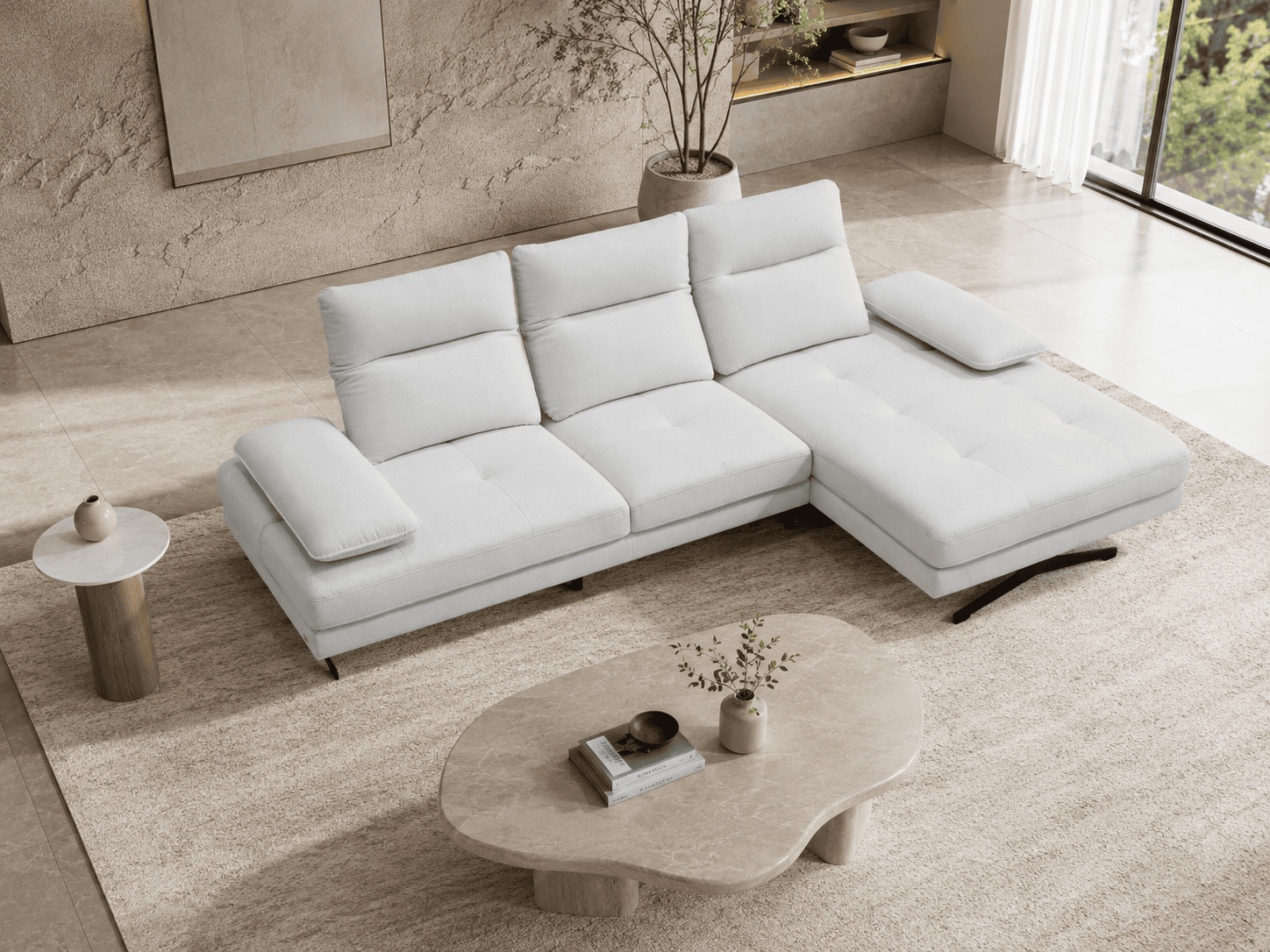 Modern white sectional sofa in a stylish living room with large window and decor.