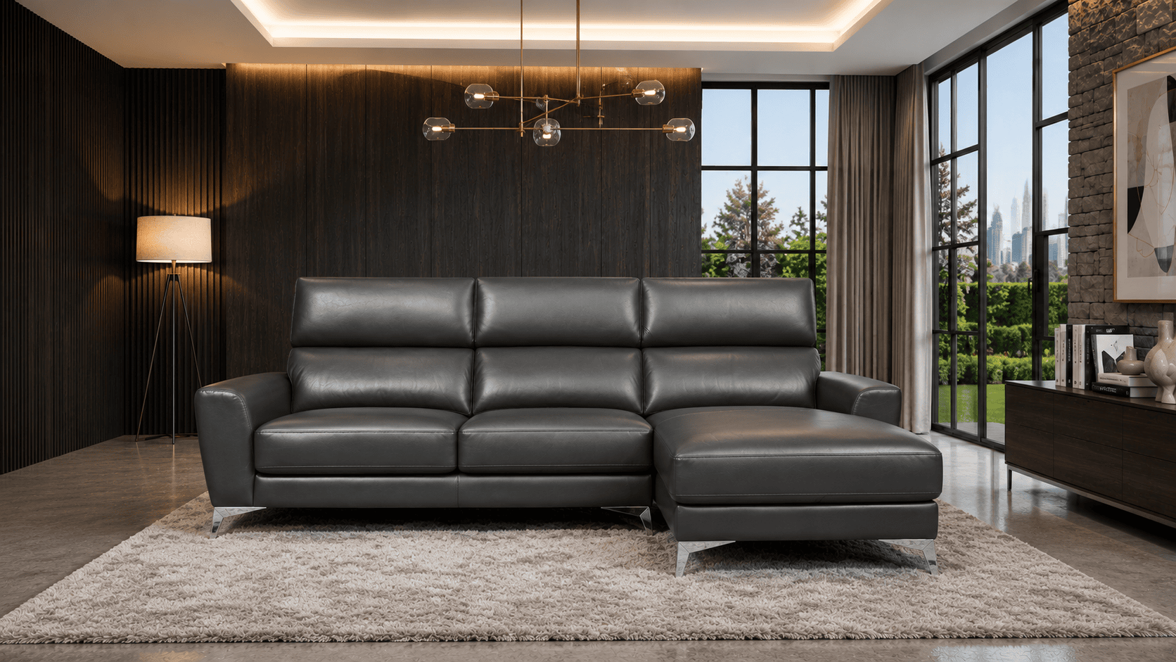 Modern black leather sofa in stylish living room with large windows and city view.