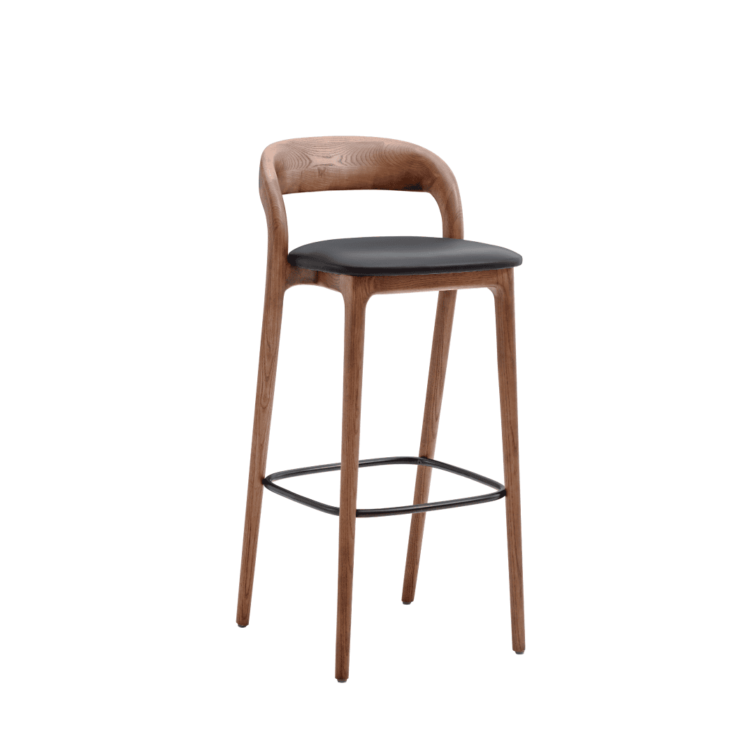 A stylish wooden bar stool with a black cushioned seat and metal footrest.