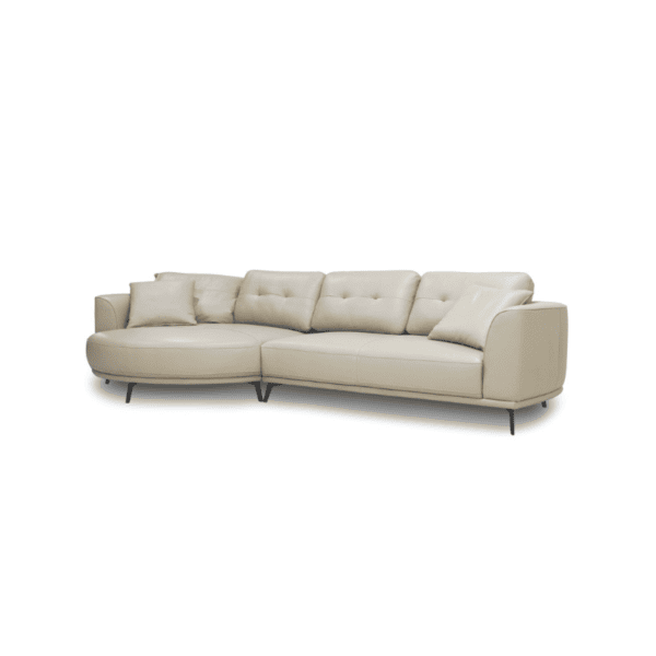 A comfortable modern beige sofa with cushions, ideal for stylish living rooms.