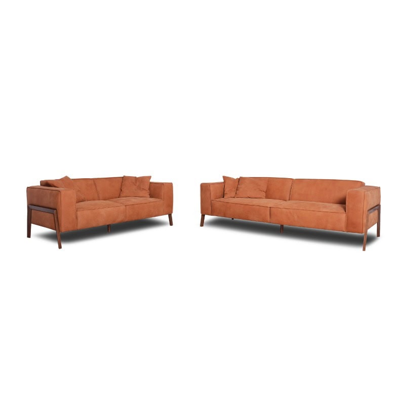 Two orange velvet sofas with wooden legs, modern living room furniture.