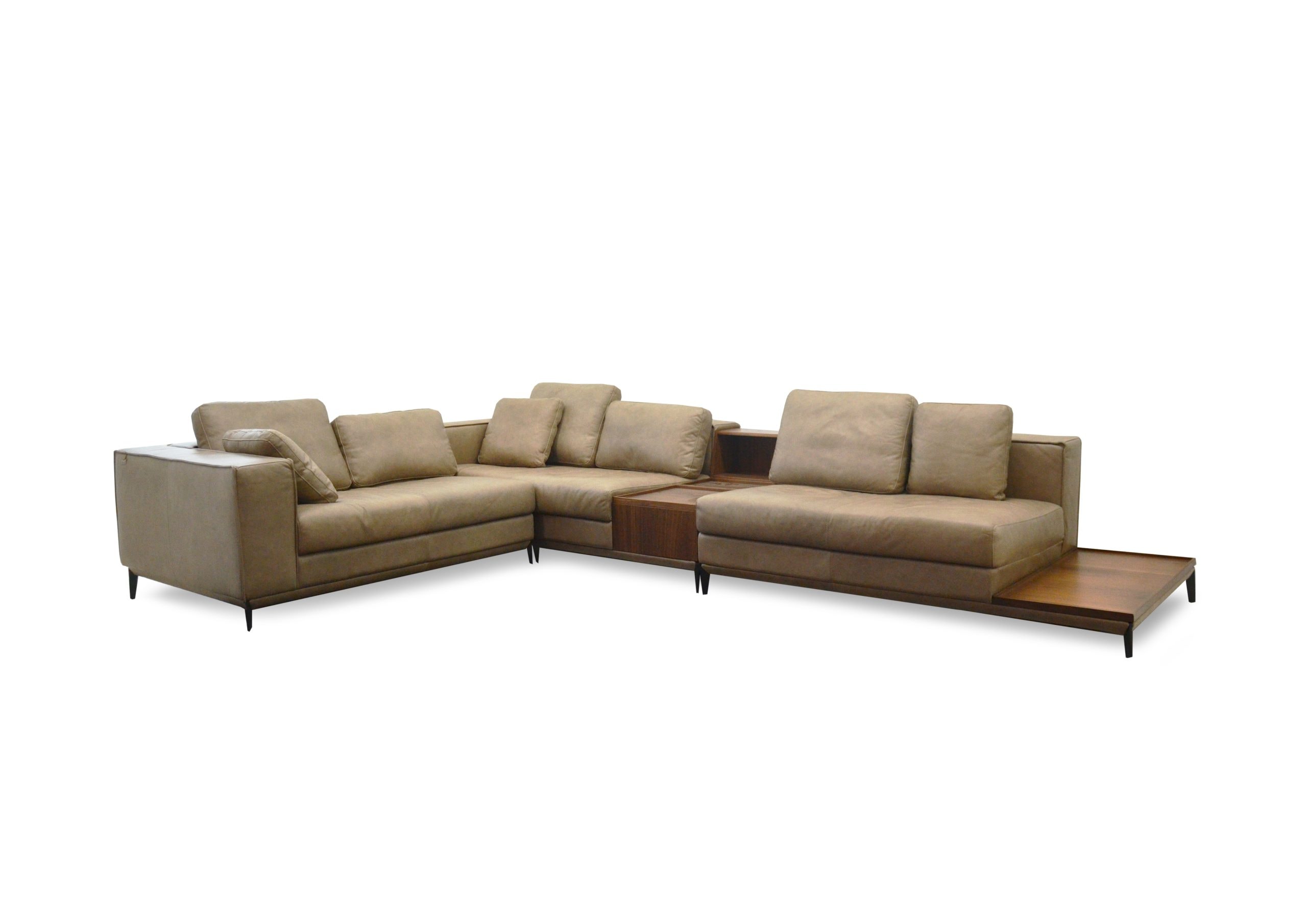A modern beige sectional sofa with wooden accents, ideal for living rooms.
