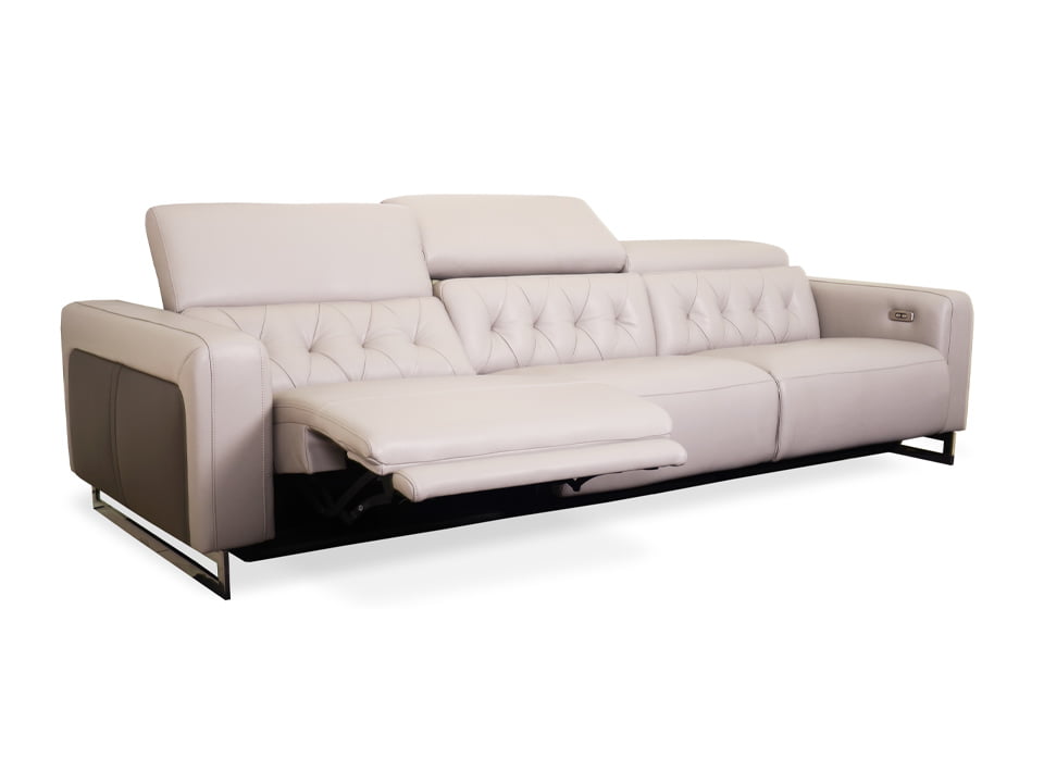 Modern white leather sofa with adjustable headrest and sleek design.