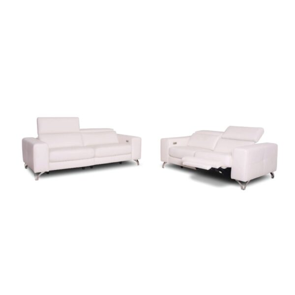 Elegant white leather sofas in a modern living room setting, stylish and comfortable.