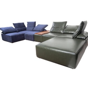 Modern sectional sofa with blue and green leather upholstery and cushions.