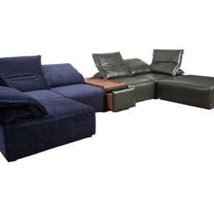 Modern sectional sofa with navy and green upholstery and wooden side table.
