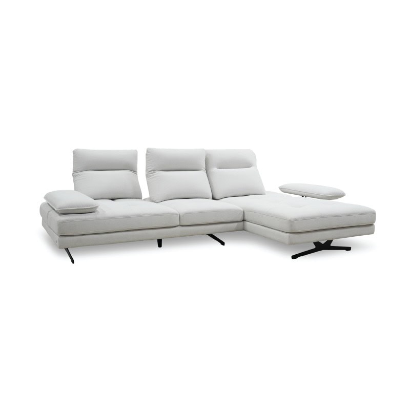 A modern white sectional sofa with adjustable headrests and a chaise lounge for stylish living room.