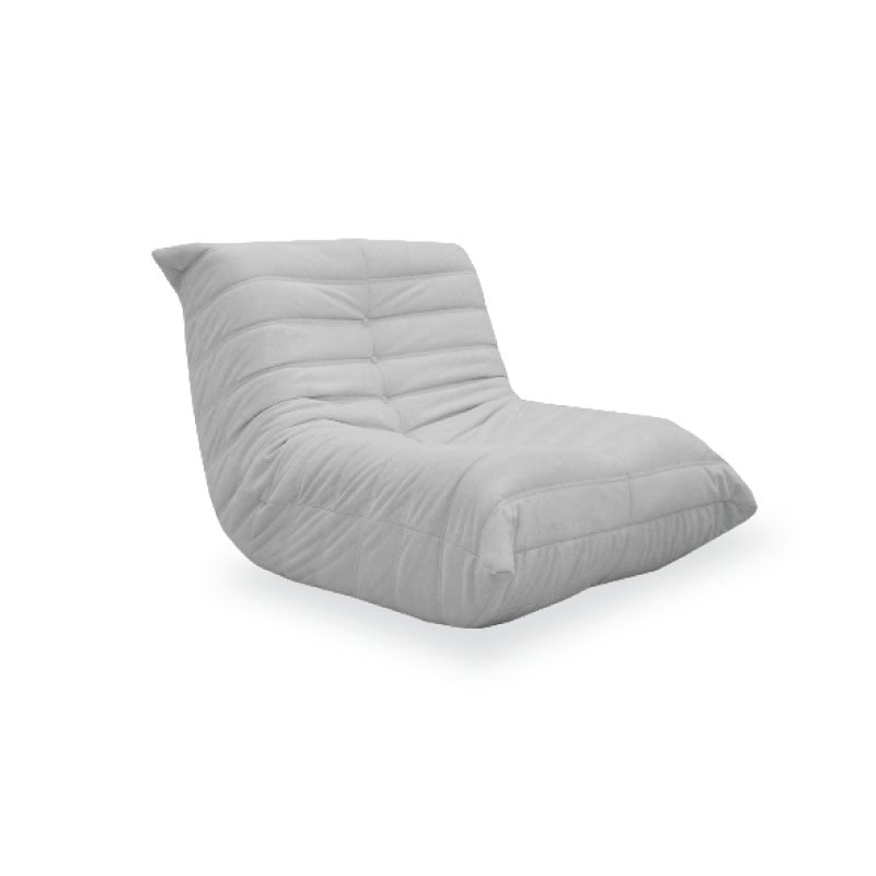 A comfortable, modern Togo chair with plush cushioning for stylish relaxation.